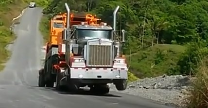 Truck pulls wheelie, amazing power