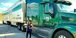 FilipinaFemale Truck Driver Connecting Double Trailers