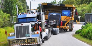 Caterpillar 777 Mining Haul Truck Transported by 11 Axle Lowboy